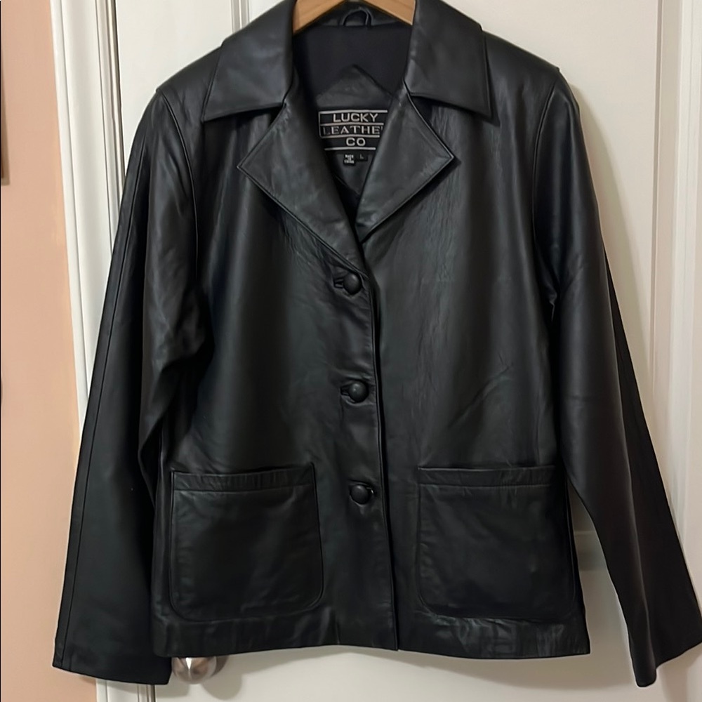 Black Leather Jacket with Notched Lapel and soft buttery finish.
